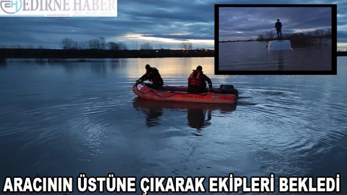 Aracının üstüne çıkarak ekipleri bekledi