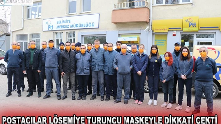 Postacılar lösemiye turuncu maskeyle dikkati çekti