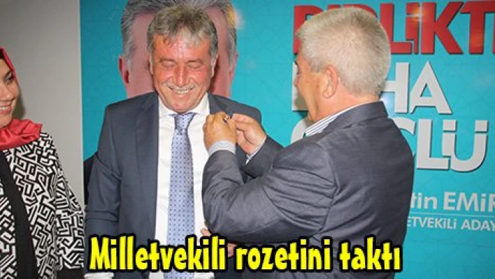 Milletvekili rozetini taktı