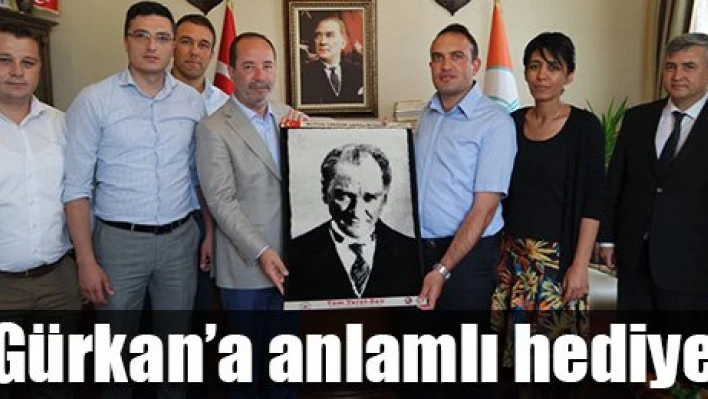 Gürkan'a teşekkür plaketi